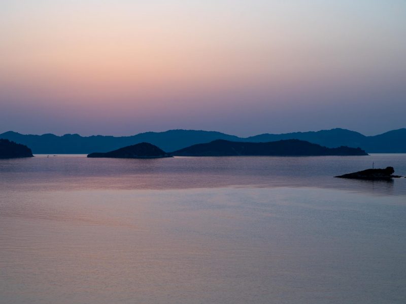 A view of the pre-sunrise glow from a Skiathos beach