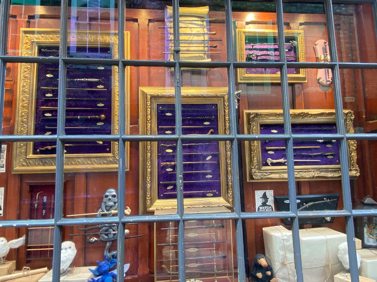 store window showing magic wands