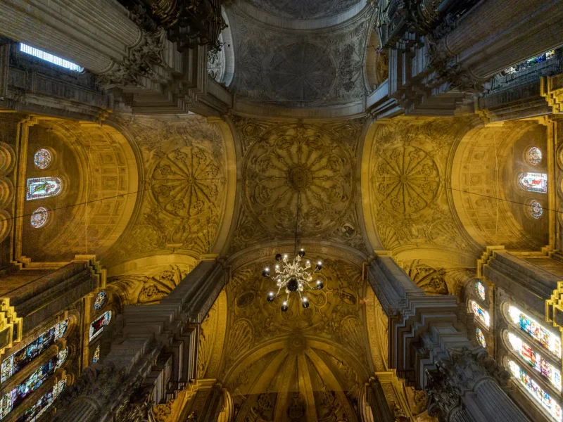 Malaga Cathedral Interior-8 Ornate cathedral ceiling with stained glass