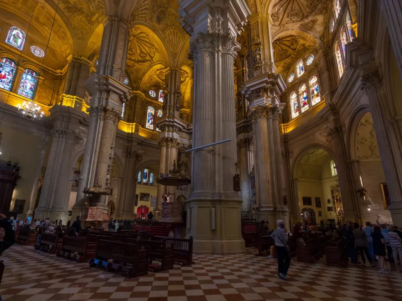 Malaga Cathedral Interior-9 Elegant interior with stained glass windows