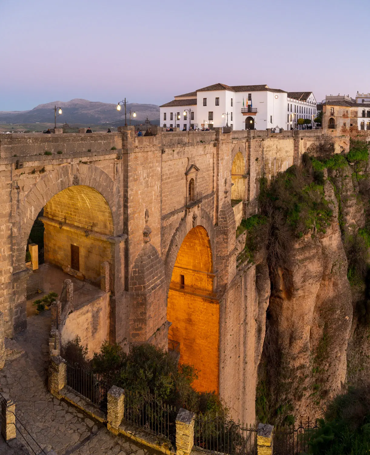 Ronda New Bridge Evening Historic bridge over a deep gorge.